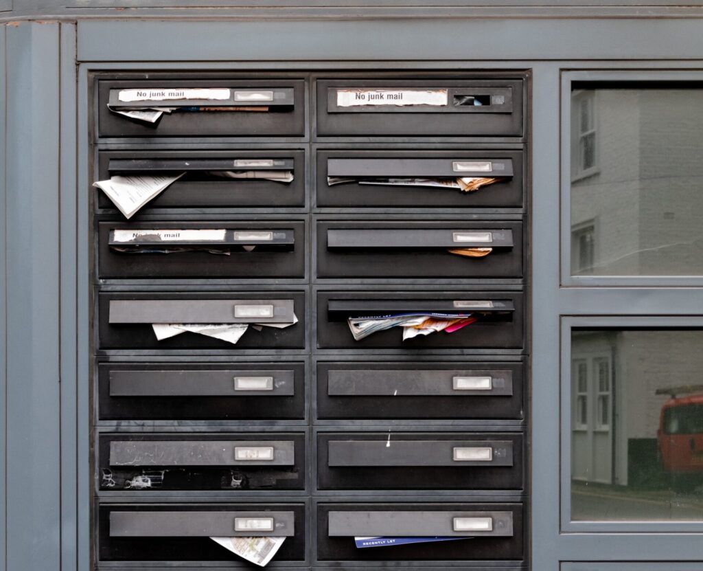 Mailboxes with paper sticking out